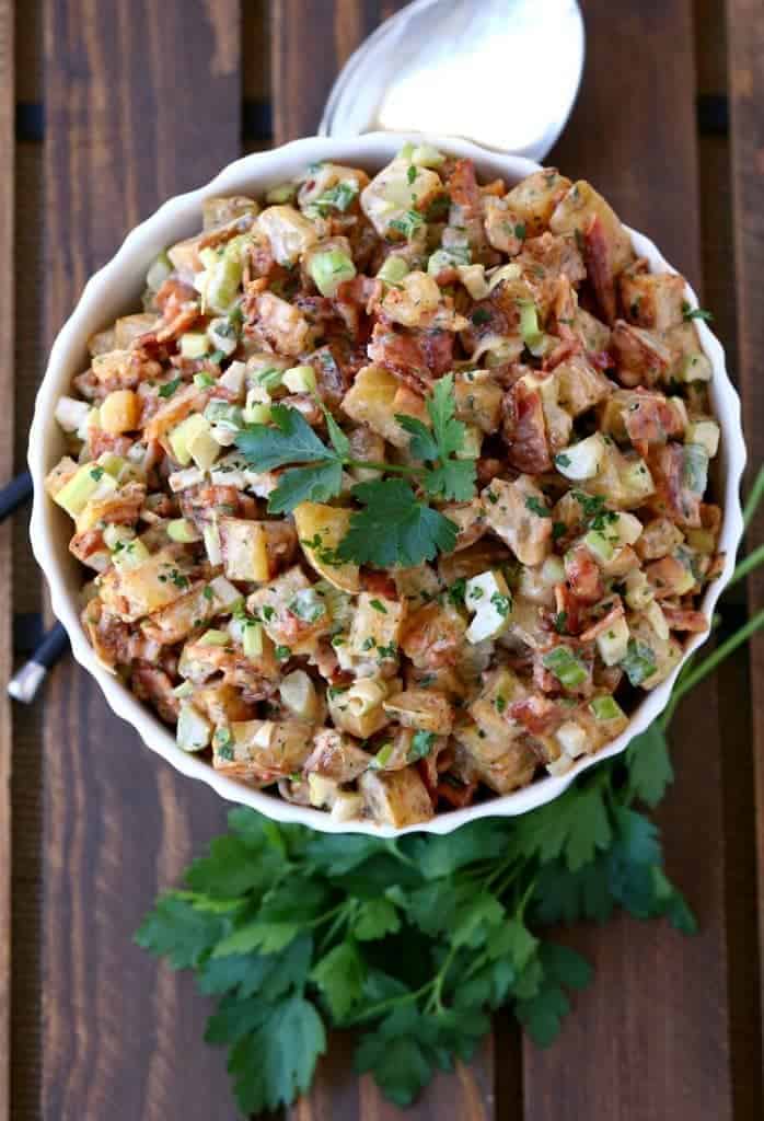 Oven Roasted Barbecue Potato Salad starts with roasting the potatoes, tossed in a creamy BBQ sauce!