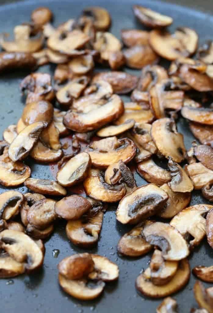 Chicken Marsala Fettuccini Alfredo starts with browning the mushrooms