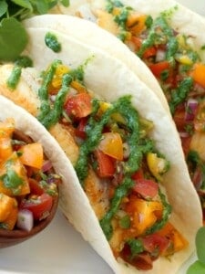 Fish Tacos with Tomato Salsa and Fresh Watercress Sauce are not only delicious but super healthy too!