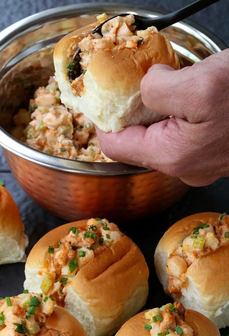 shrimp salad bring stuffed into a slider bun