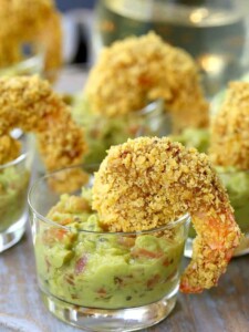 tortilla breaded shrimp in dish with guacamole