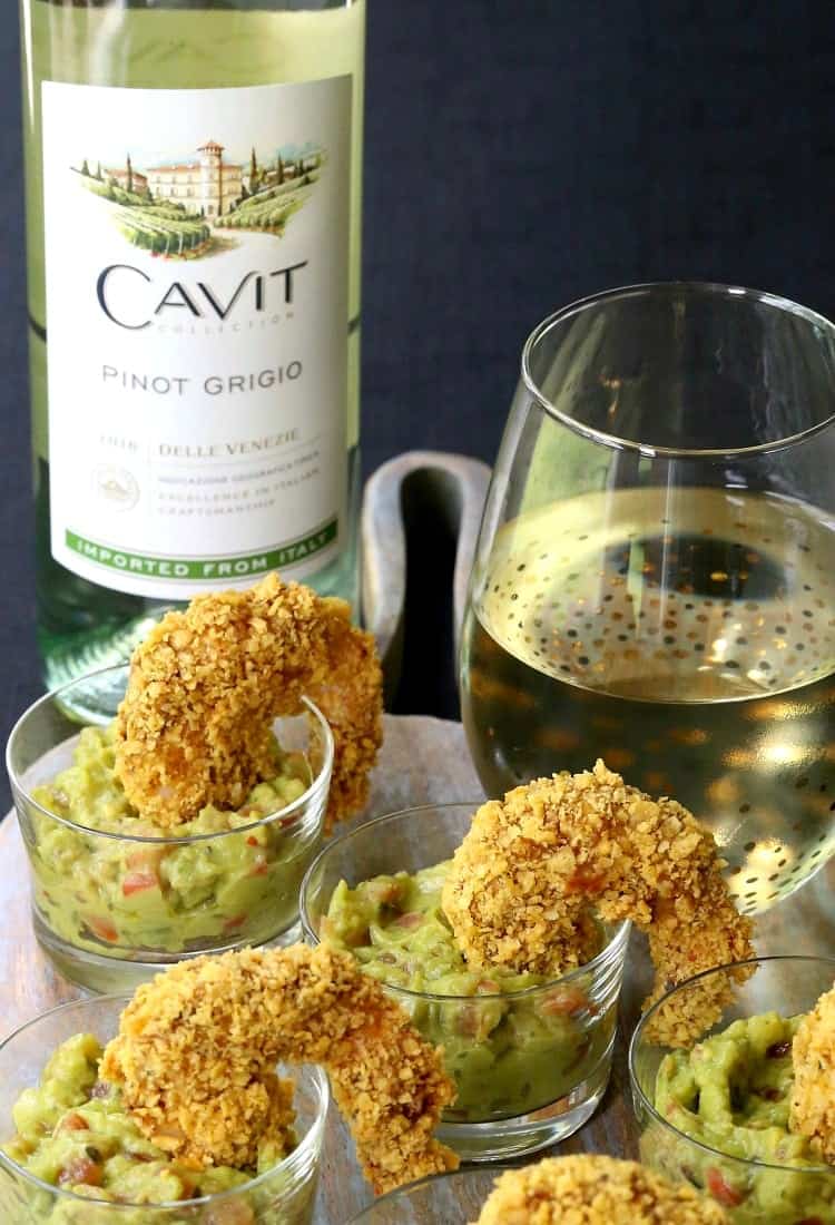 Crunchy Tortilla Shrimp are fun for a tapas night or happy hour! Jumbo shrimp breaded in crushed tortilla chips and baked until crispy! These Tortilla Crusted Taco Shrimp go perfectly with a glass of wine!