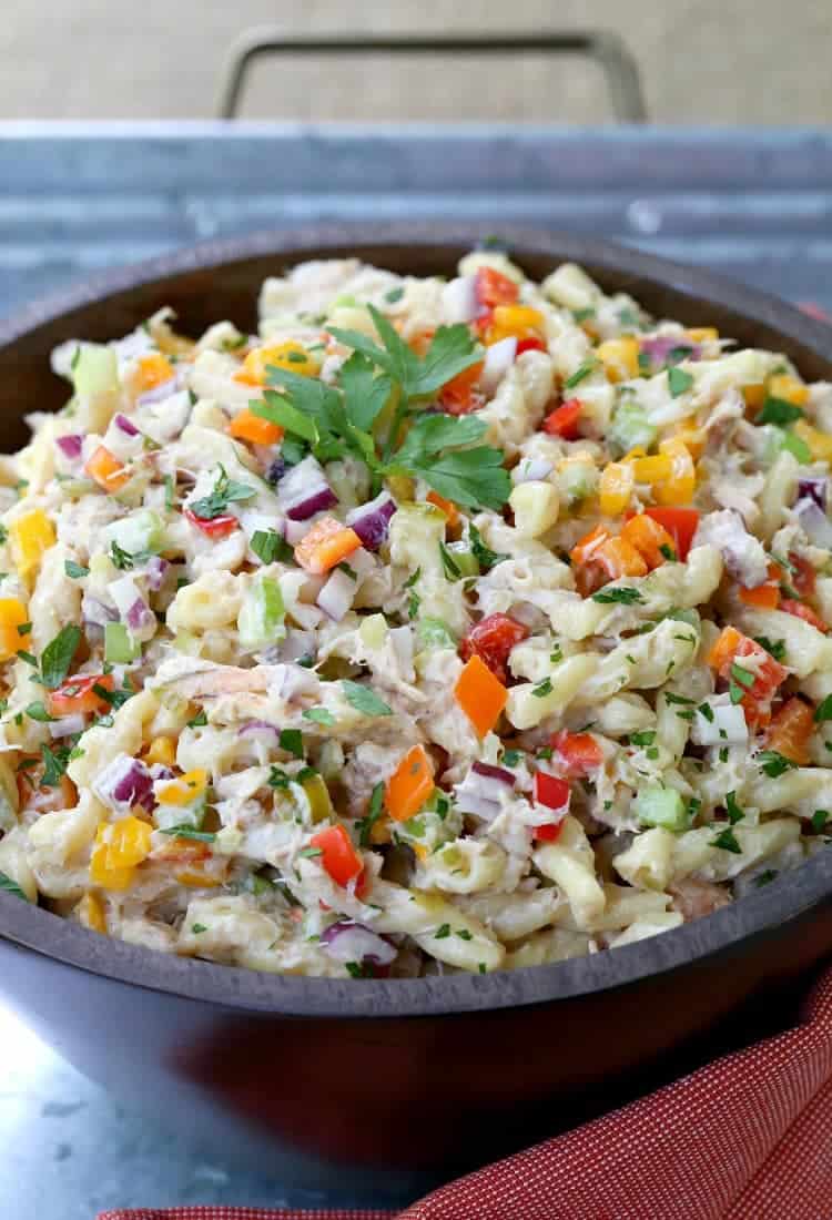 This Crab Pasta Salad is loaded with crab meat and tons of vegetables! All the flavors of a crab cake tossed with pasta and a tangy dressing! Crab Cake Pasta Salad is a side dish recipe for barbecues or picnics