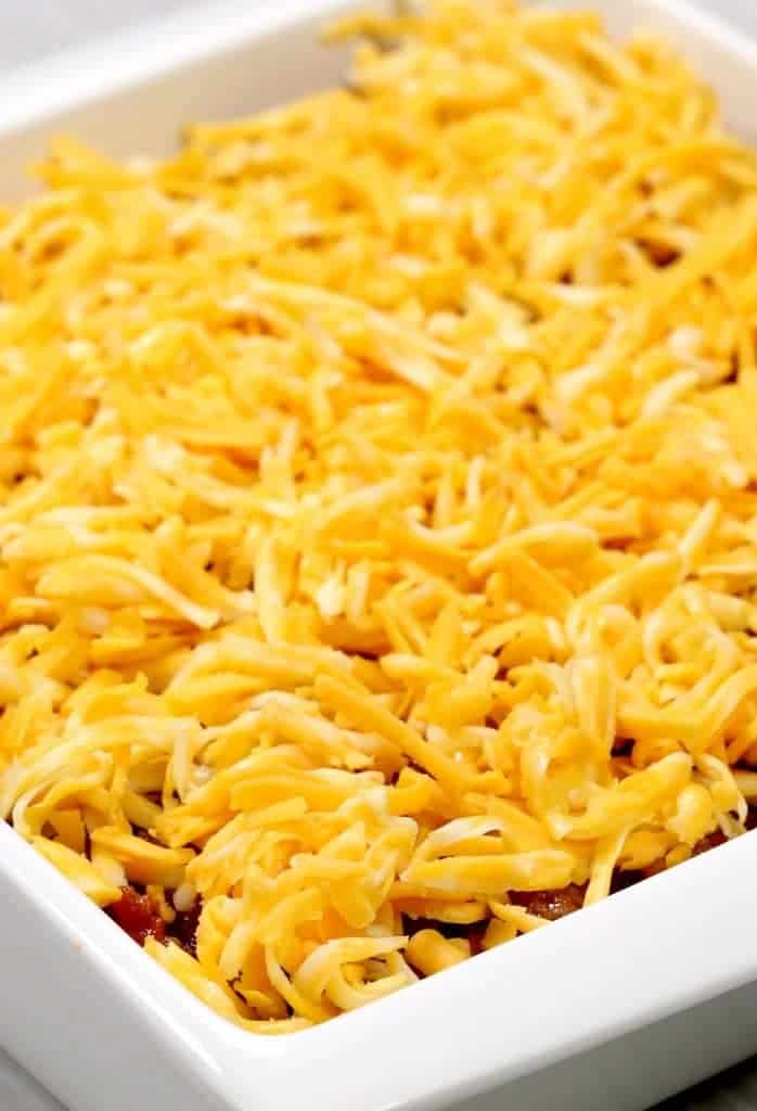 Cheese in a baking dish for a layered dip