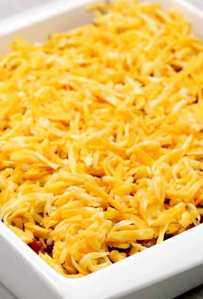 Cheese in a baking dish for a layered dip