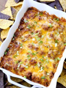 This Loaded Beef Burrito Layered Dip is the appetizer that eats like a meal!