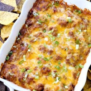 This Loaded Beef Burrito Layered Dip is the appetizer that eats like a meal!
