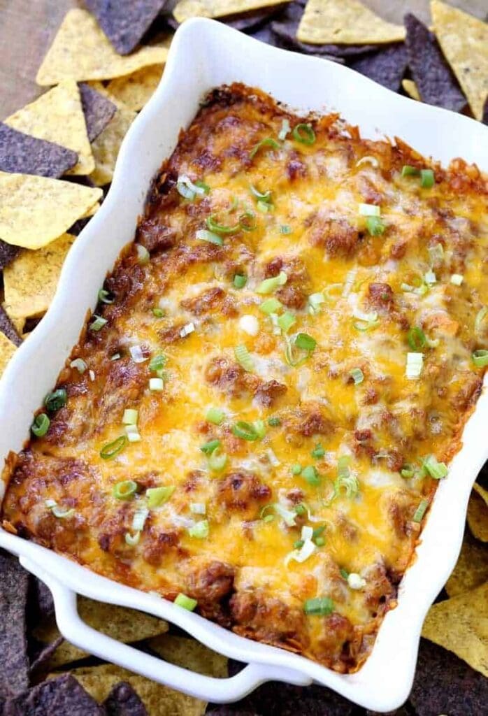 This Layered Beef Burrito Dip is the appetizer that eats like a meal!