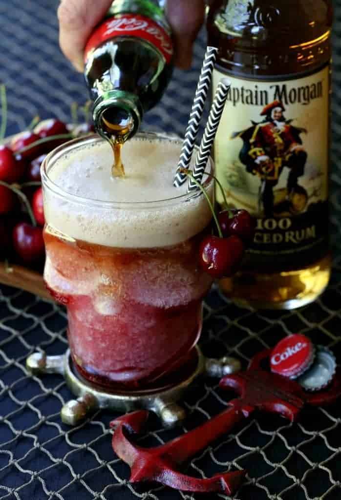 Frozen Rum and Cherry Coke pouring cola