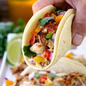 Slow Cooker Crispy Chicken Carnitas can be served with all your favorite toppings!