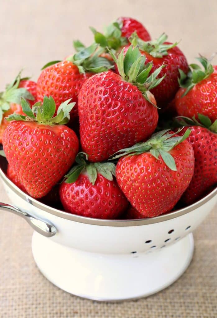 strawberries in colander for dessert dip