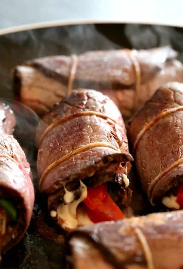 This Short Cut Beef Braciole sears in a skillet for a few minutes before baking!