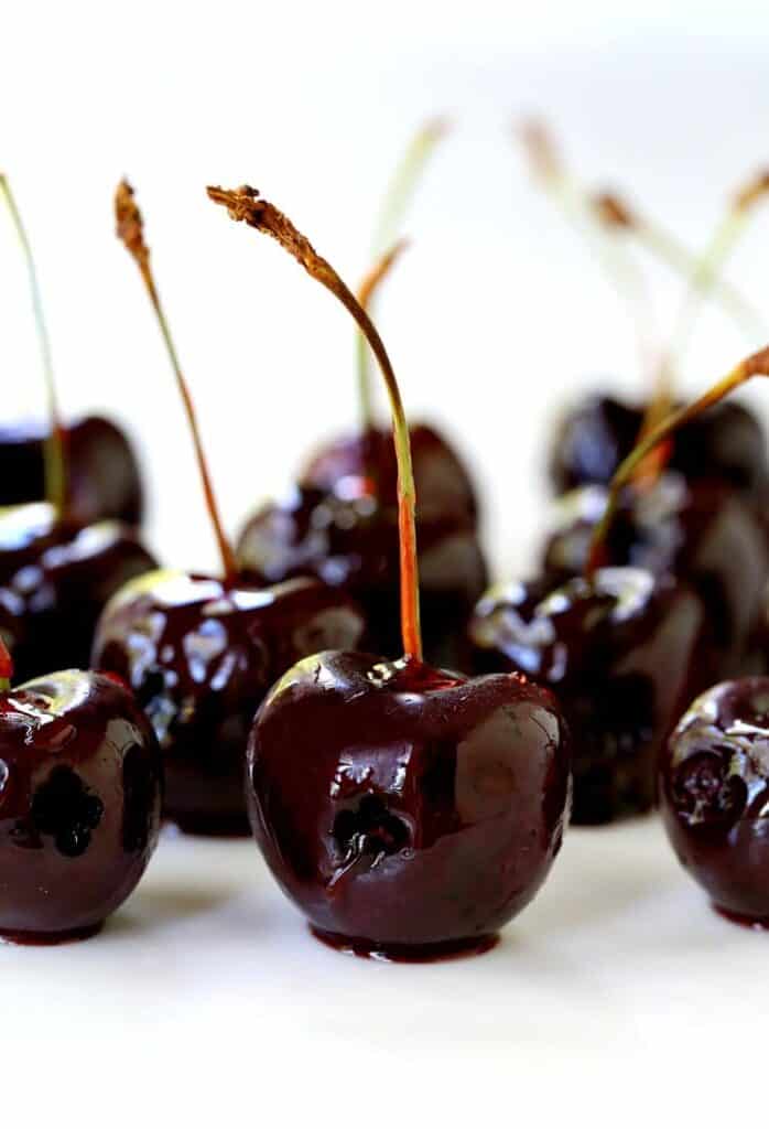 Candied Fireball Cherries on white plate