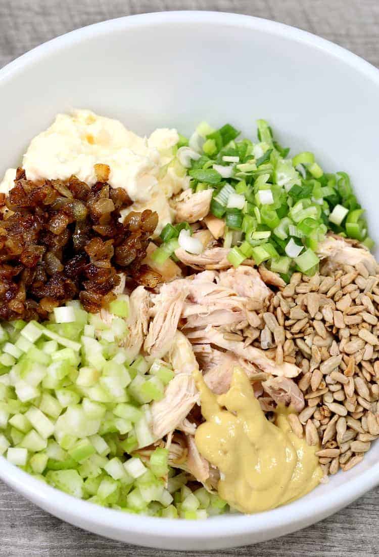 Caramelized Onion Chicken Salad is sweet and creamy with a bit of crunch! Sweet, caramelized onions takes this chicken salad over the top! Caramelized Onions Chicken Salad, ingredients in a bowl