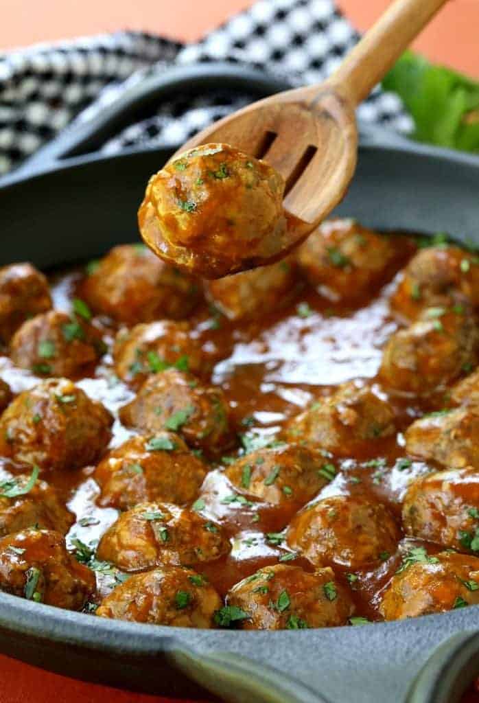 Pumpkin Glazed Cocktail Meatballs are an easy meatball recipe that's tossed in a sweet and spicy glaze