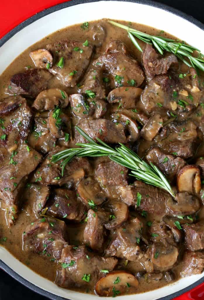 Marsala Wine Beef Stew in a pot with rosemary
