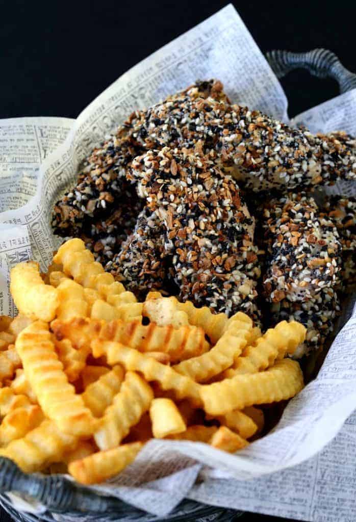 Everything Bagel Chicken Tenders in a basket with fries