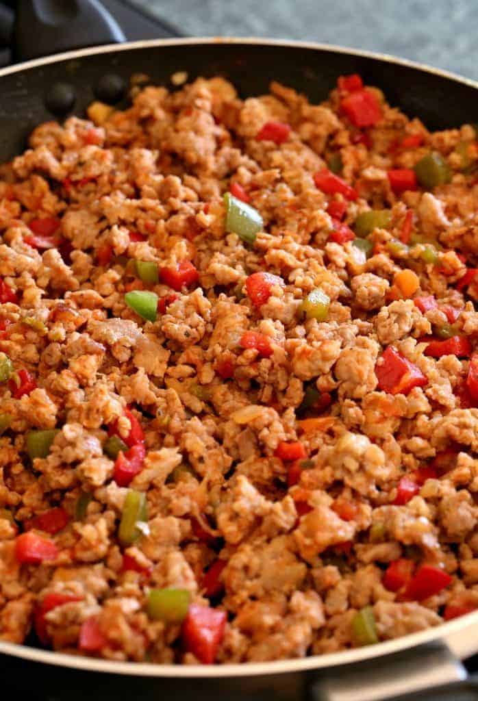 These Italian Egg Rolls start with a sausage, pepper and onion filling.