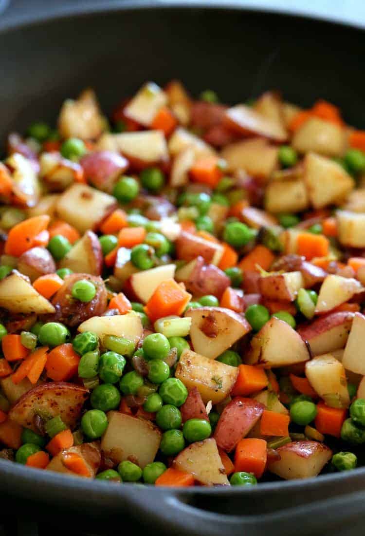 Skillet Chicken Pot Pie with Cornbread Topping is loaded with vegetables!