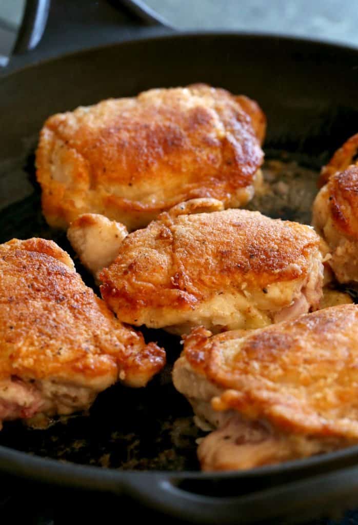 These Upside Down Pineapple Chicken Thighs start by browning the thighs until crispy!