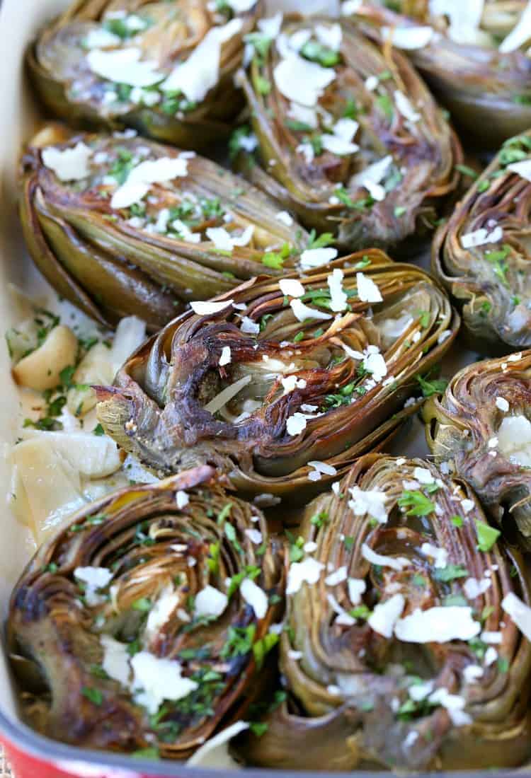 Roasted artichokes in a baking dish