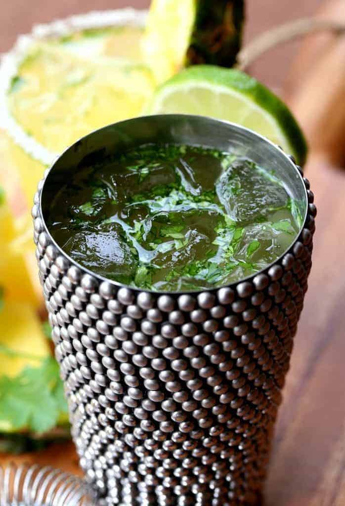 This Spicy Pineapple Cilantro Margarita has fresh cilantro mixed in!