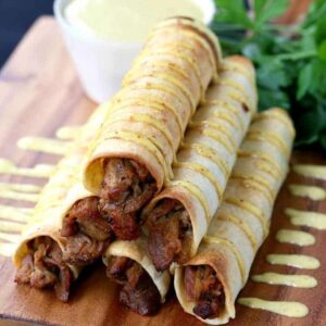 This Honey Mustard Pulled Pork Taquitos recipe is perfect for appetizers or dinner!