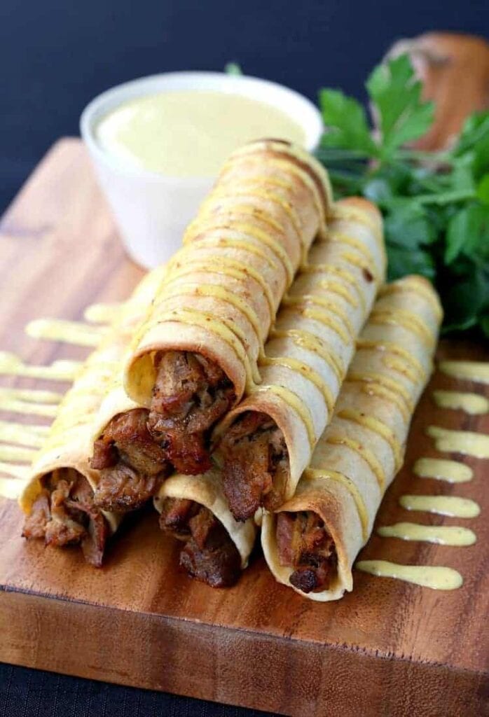 This Honey Mustard Pulled Pork Taquitos recipe is perfect for appetizers or dinner!