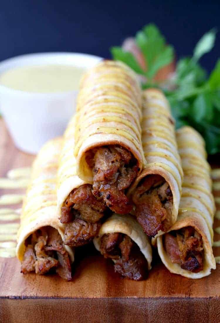 These Cinco de Mayo Recipes are going to make your party memorable. Fun dinner ideas that are totally on theme and so delicious! These Honey Mustard Pulled Pork Taquitos are baked, not fried!