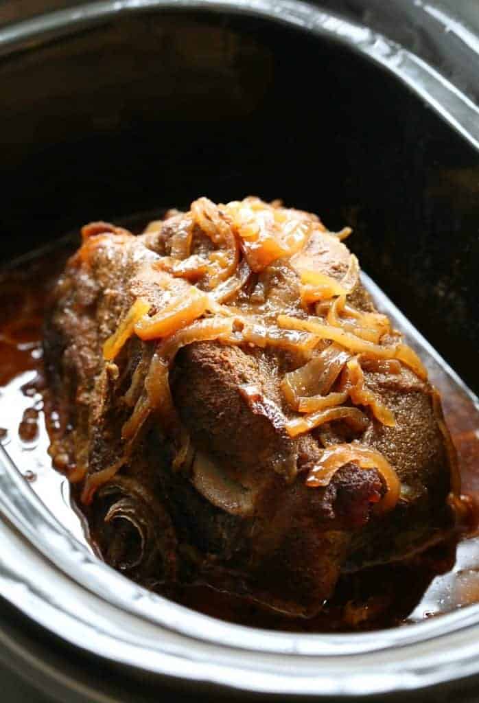 cooked pork but with onions in slow cooker
