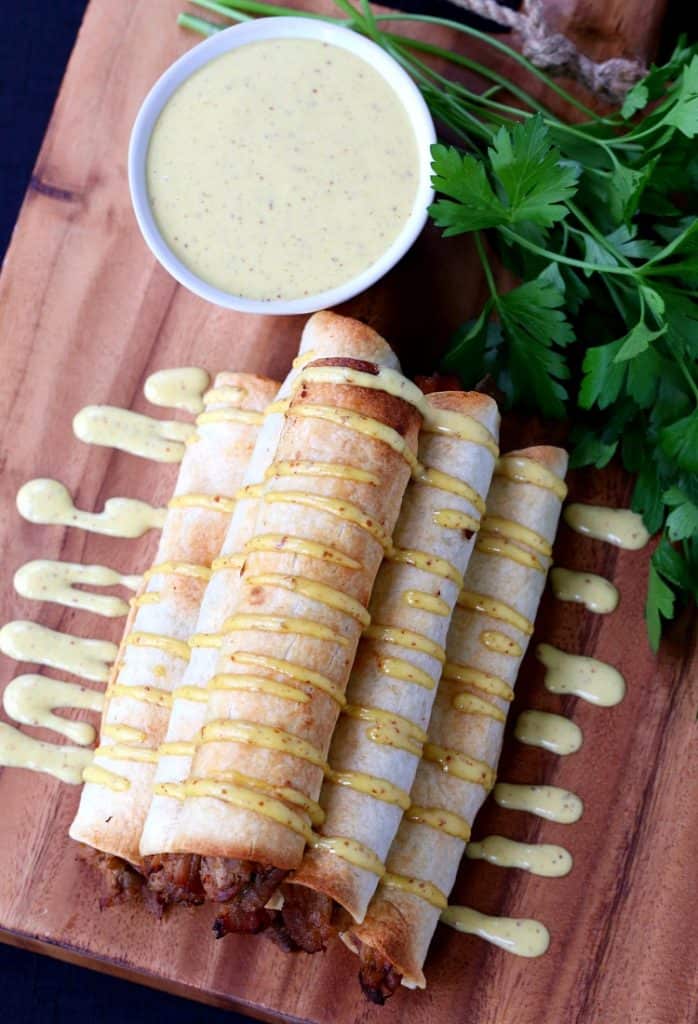 These Honey Mustard Pulled Pork Taquitos are perfect for parties!