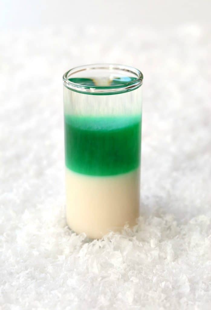 These Layered Candy Cane Shots are going to be a hit for the holidays!