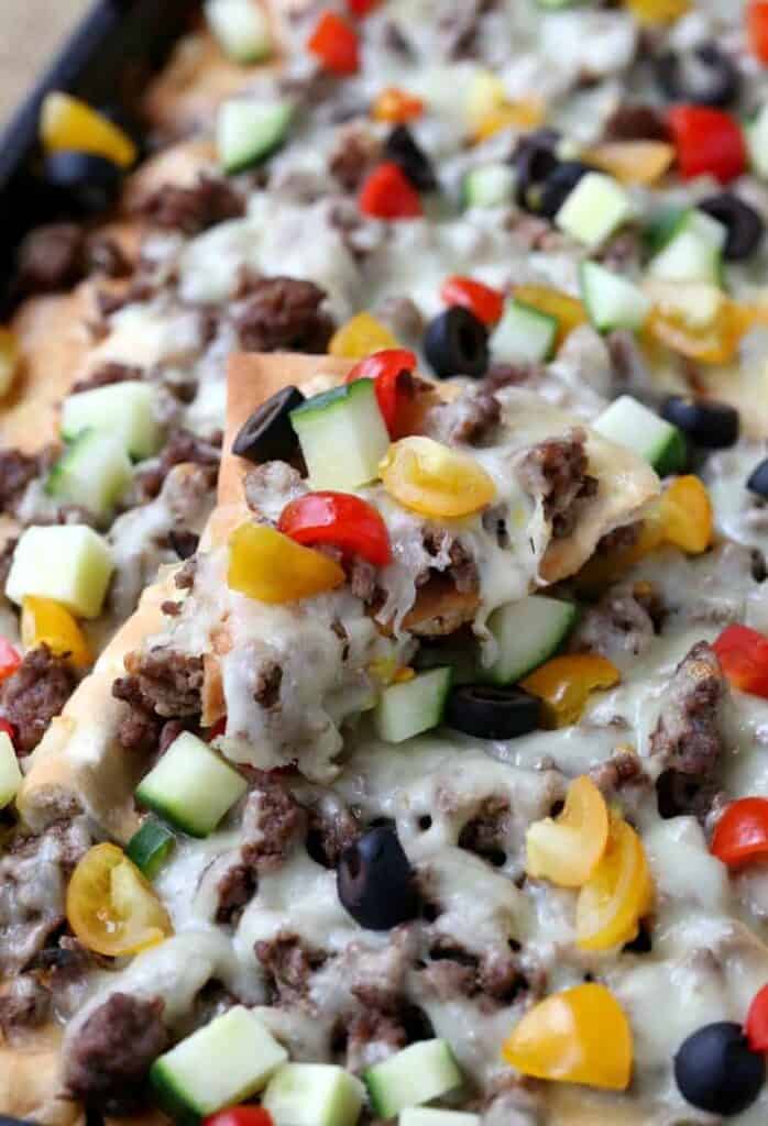 greek nachos are nachos with a pita bread base