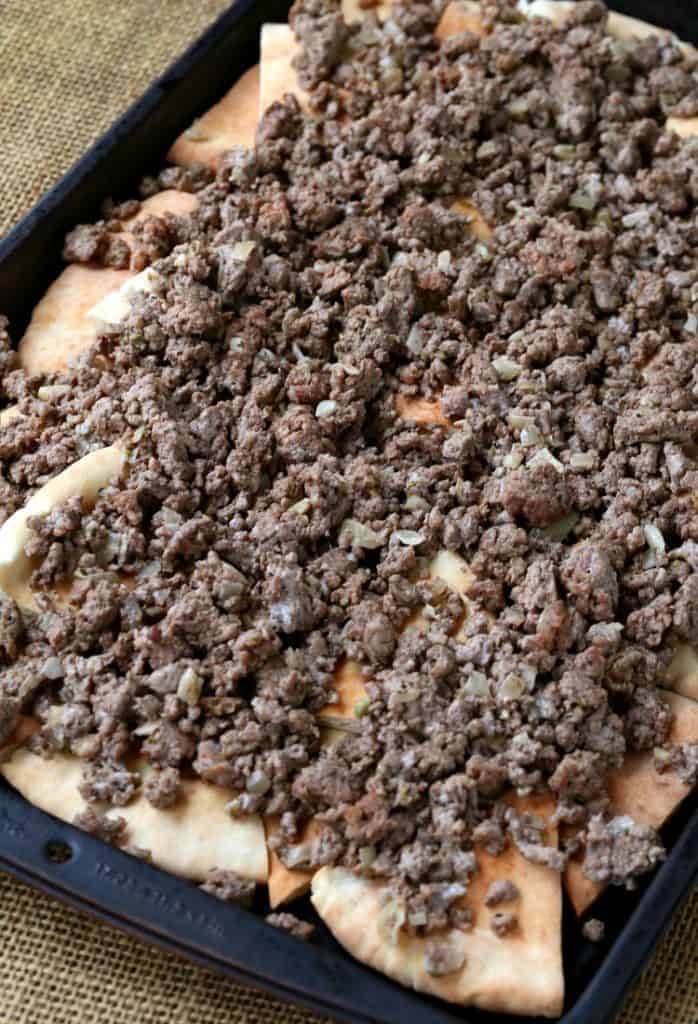 a mixture of ground beef and lamb top this greek nacho recipe