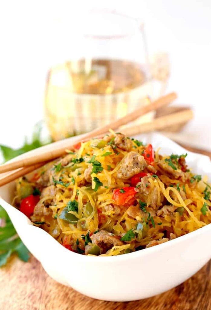 Sausage and Pepper Spaghetti Squash Stir Fry is a stir fry recipe made with roasted spaghetti squash, sausage and peppers