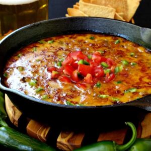 This Skillet Sausage and Beer Queso is perfect for parties!