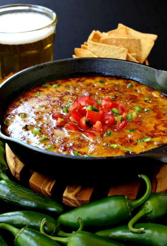 This Skillet Sausage and Beer Queso is perfect for parties!