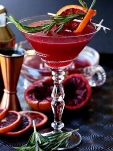 Blood Orange Rosemary Gin Martini with orange slices and shaker