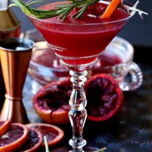Blood Orange Rosemary Gin Martini with orange slices and shaker