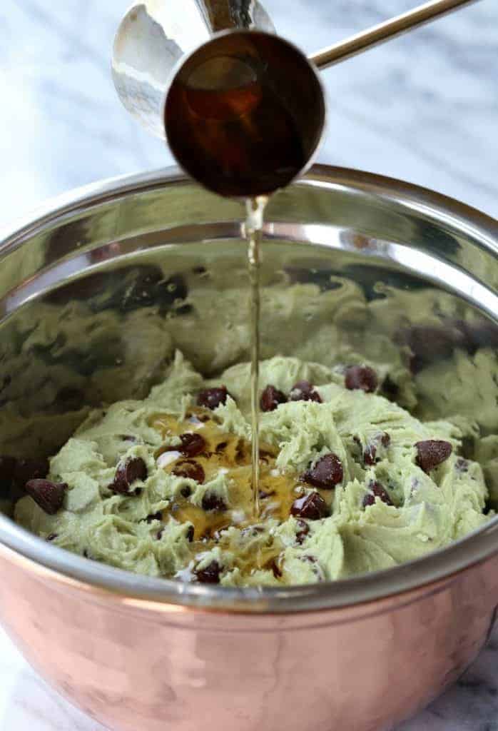 whiskey pouring into cookie dough