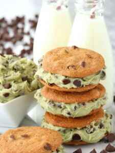 Boozy Chocolate Chip Cookie Dough Sandwiches with bottles of milk