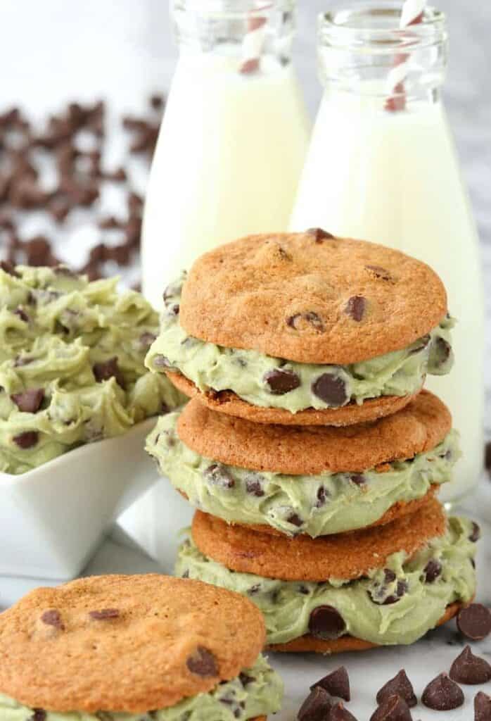 cookie dough sandwiches stacked with milk bottles