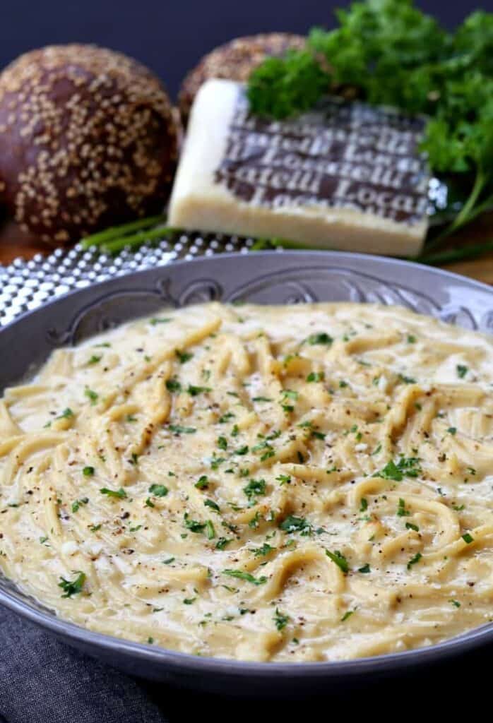 Cacio e Pepe Chowder in a bowl with parsley