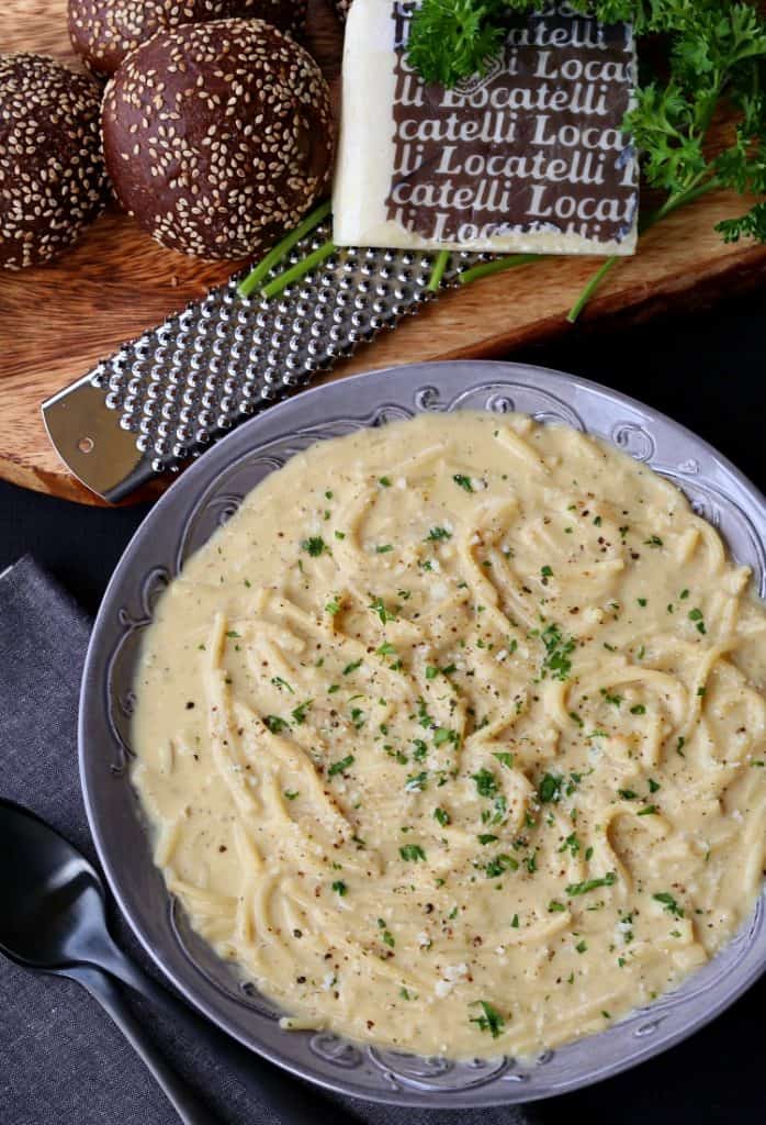 Cacio e Pepe Chowder in a bowl with parsley from the top