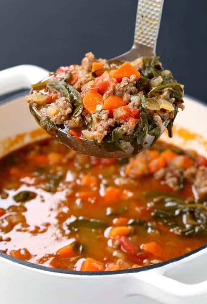 Low Carb Sausage Vegetable Soup in a ladle