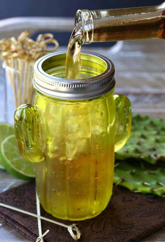 Tequila Rosé Spritzer with wine pouring in glass