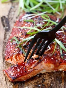 Oven Baked Asian BBQ Salmon with a fork