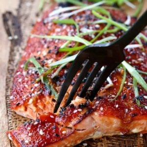 Oven Baked Asian BBQ Salmon with a fork