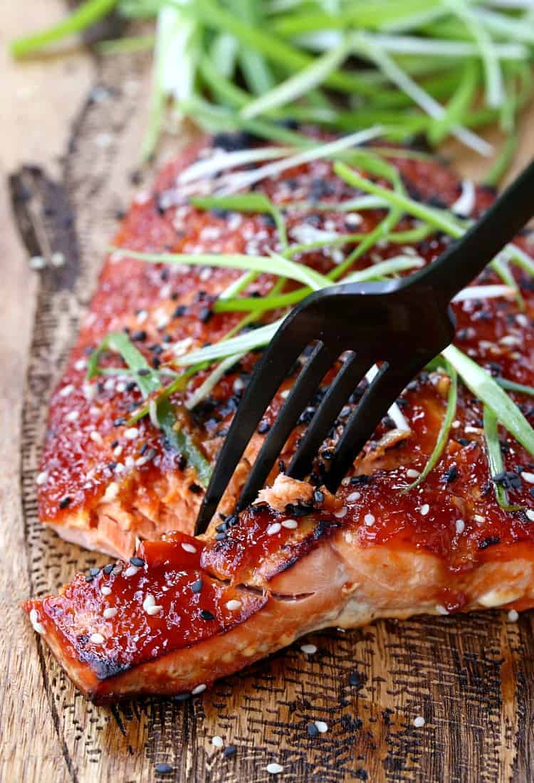 Oven Baked Asian BBQ Salmon with a fork