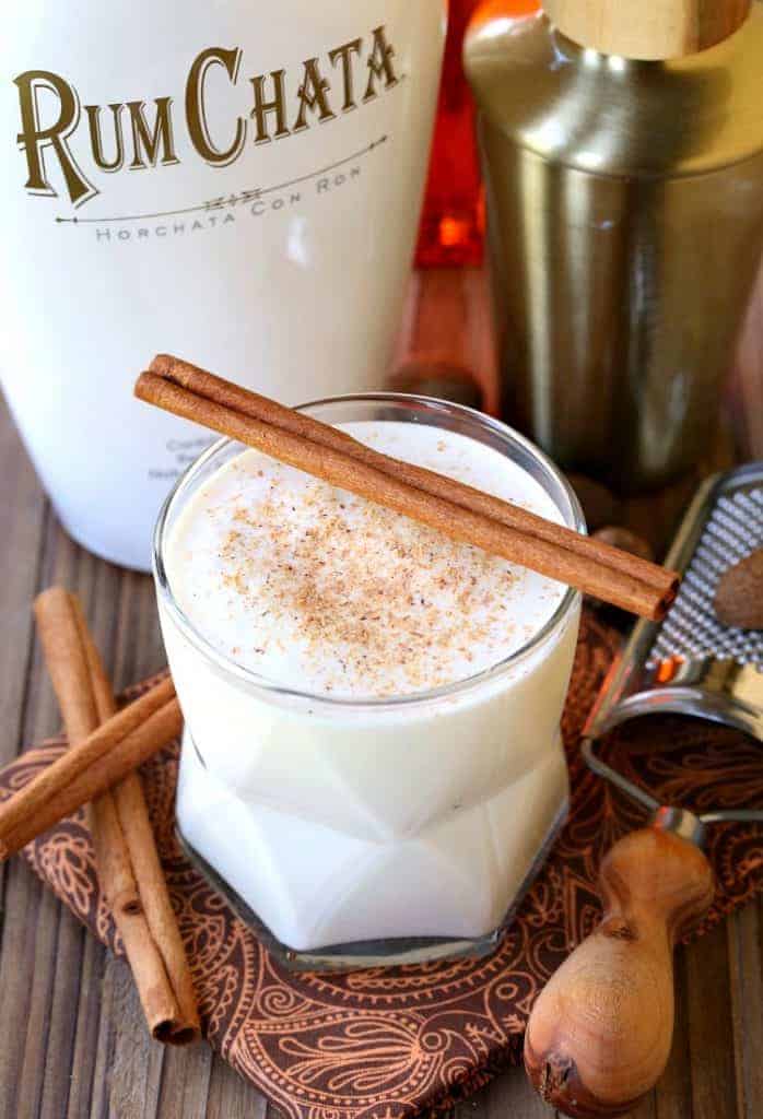 Campfire Milk Punch with a cinnamon stick on top